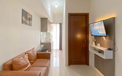 Minimalist 1BR Apt Vittoria Residence By Travelio