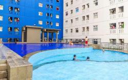Minimalist Studio Green Pramuka Apt By Travelio