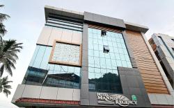 Super Hotel O Pathanamthitta Near Mahatma Gandhi Statue