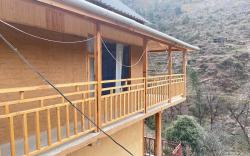 Rustic River View Cottage Tirthan by Homeyhuts