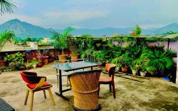BHOORA HOUSE Rooftop Room AC Fridge Open Kitchen