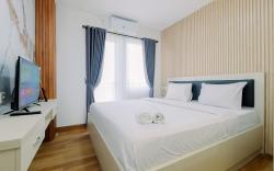 Restful Modern 2BR at Sentul Tower Apt By Travelio