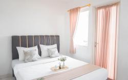 Cozy Living 1BR at Sentul Tower Apt By Travelio