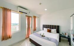 Minimalist Cozy Studio Sentul Tower By Travelio
