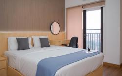 Cozy Studio at Atria Residence Apt By Travelio
