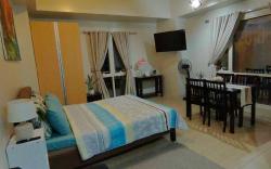 ROOMY Condotel Across NAIA T3
