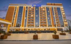 FabHotel Prime Spectrum Metro - With Pool |  5 mins Walk from Sector 75 Metro