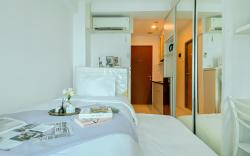 Comfy Minimalist Studio Apt at Tifolia By Travelio