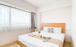 Comfy Stay 2BR at Meikarta Apartment By Travelio