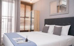 Cozy Studio Apt at Transpark Bintaro By Travelio