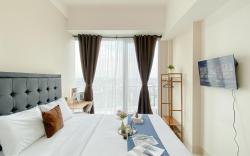 Comfy Studio Apt at Tree Park City BSD By Travelio