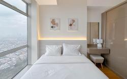 Modern Suite 1BR Grand Sungkono Lagoon By Travelio