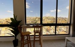 Central Amman floor-to-ceiling skyline view Apt