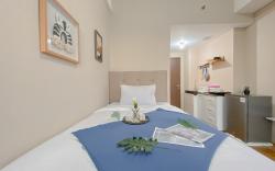 Relaxing Studio Apt Transpark Juanda By Travelio