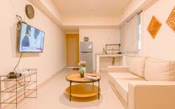 Warm and Cozy 2BR Meikarta Apartment By Travelio