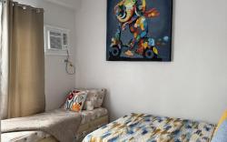 Mira's Condo at Amani Grand Residences Near Mactan International Airport