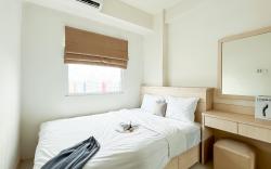 Restful Homey 2BR Green Pramuka City By Travelio