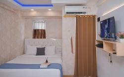 Cozy Stay Studio Apt Urbantown Serpong By Travelio