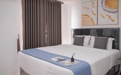 Chic 1BR Tamansari Bintaro Mansion Apt By Travelio