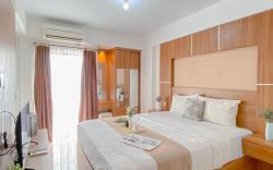 Cozy Studio at Bogor Valley Apartment By Travelio