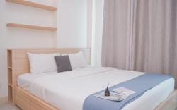 Modern Look 2BR Apt Tree Park City BSD By Travelio