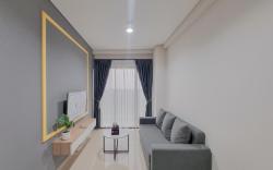 Minimalist 1BR Patraland Amarta Apt By Travelio