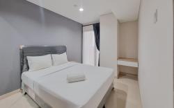Patraland Amarta 1BR Apartment By Travelio