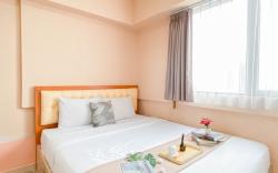 Comfort 2BR with Extra Room Meikarta By Travelio