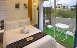 Deluxe Room 101 w/ Private Balcony