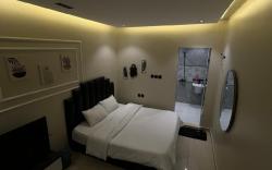 Self check-in studio with a comfortable bed