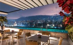 York Medellin, Curio Collection by Hilton