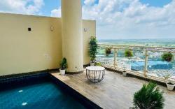 SkySwimStay – Luxury High-Rise Apartment with Pool