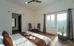 Iva 1 bhk Kainchi Dham : Balcony | Cook | Bonfire