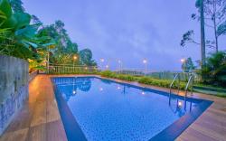 Ice Pellets Pool Resort Munnar by VOYE HOMES 