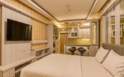 Quintessa Room at Candiland Apartement