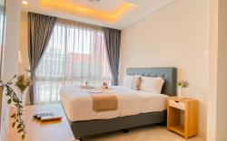 2BR Apt at Masterpiece The Epicentrum By Travelio