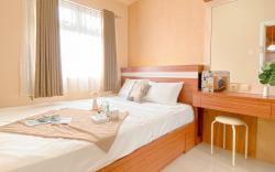 Simple Style 2BR at Green Pramuka City By Travelio