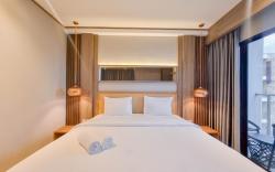 Warm Minimalist Studio Patraland Amarta ByTravelio