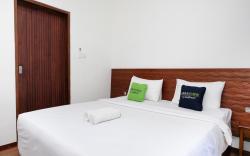 Urbanview Hotel Arta Guna Casa