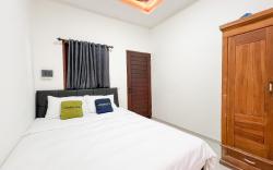 Urbanview Hotel Arta Guna Casa