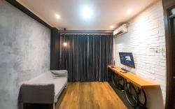 Industrial Look 2BR at Gateway Pasteur By Travelio