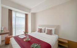 Ivory Nest 2BR at Grand Sungkono Lagoon ByTravelio