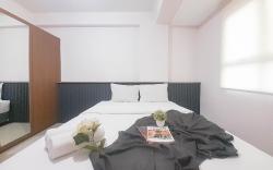 Grey Nest 2BR at Gateway Pasteur Apt By Travelio
