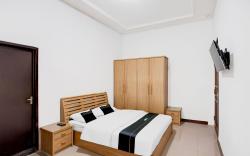 OYO 94775 Palm Cafe Inn