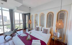 1BR near UINSA at Tamansari Papilio By Travelio