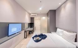 Minimalist Look Studio Apt at Art Deco By Travelio