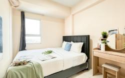 Basic 2BR Apt at Green Palm Residence By Travelio