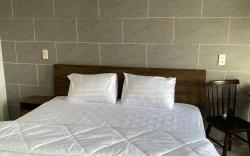 Balcony view room with vinyl record machine.