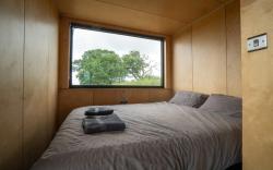 Merlin: Timber Tiny Home + Pub