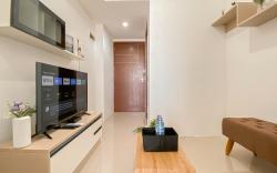 Basic 1BR Apartment Vittoria Residence By Travelio